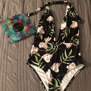One piece bathing suit.  Cupshe years of Flowers